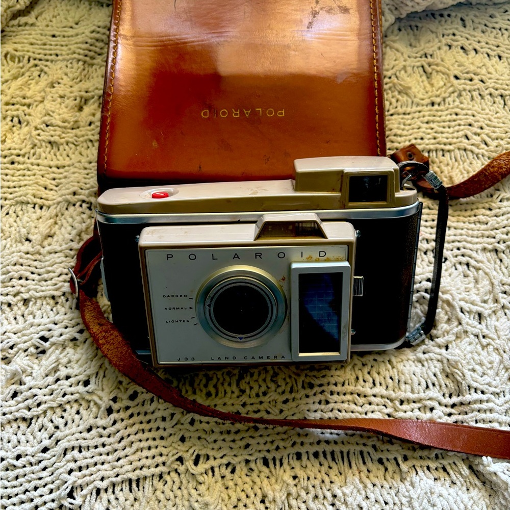 Vintage Polaroid camera and case